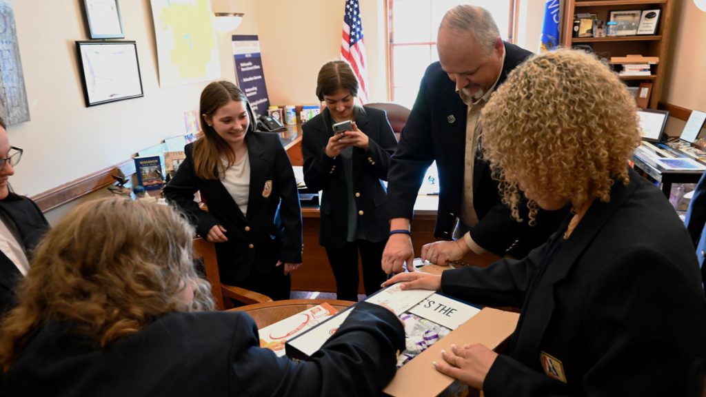 JAG students meet with Rep. Jessie James in his office